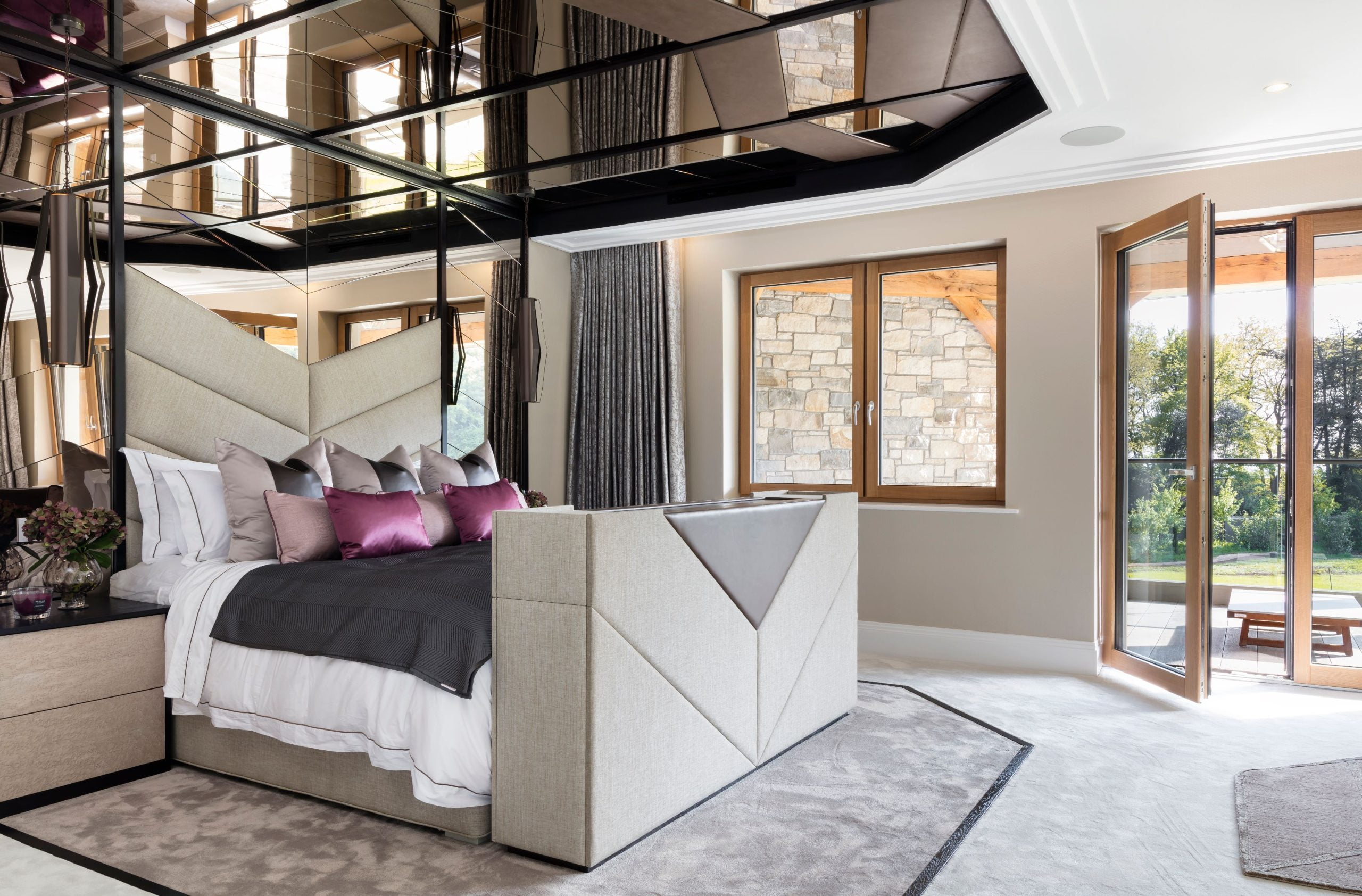 Beautiful doors, windows, and bed in a room